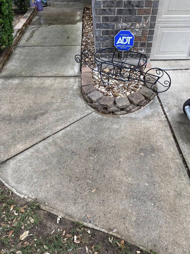 Before pressure washing: driveway and front walk