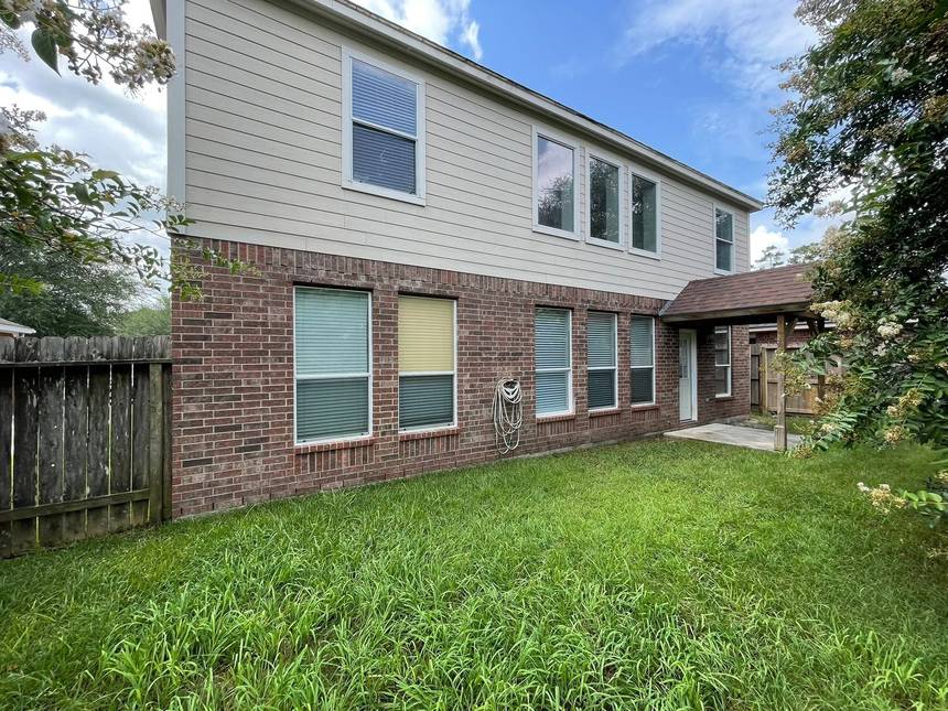 After pressure washing: siding and brick