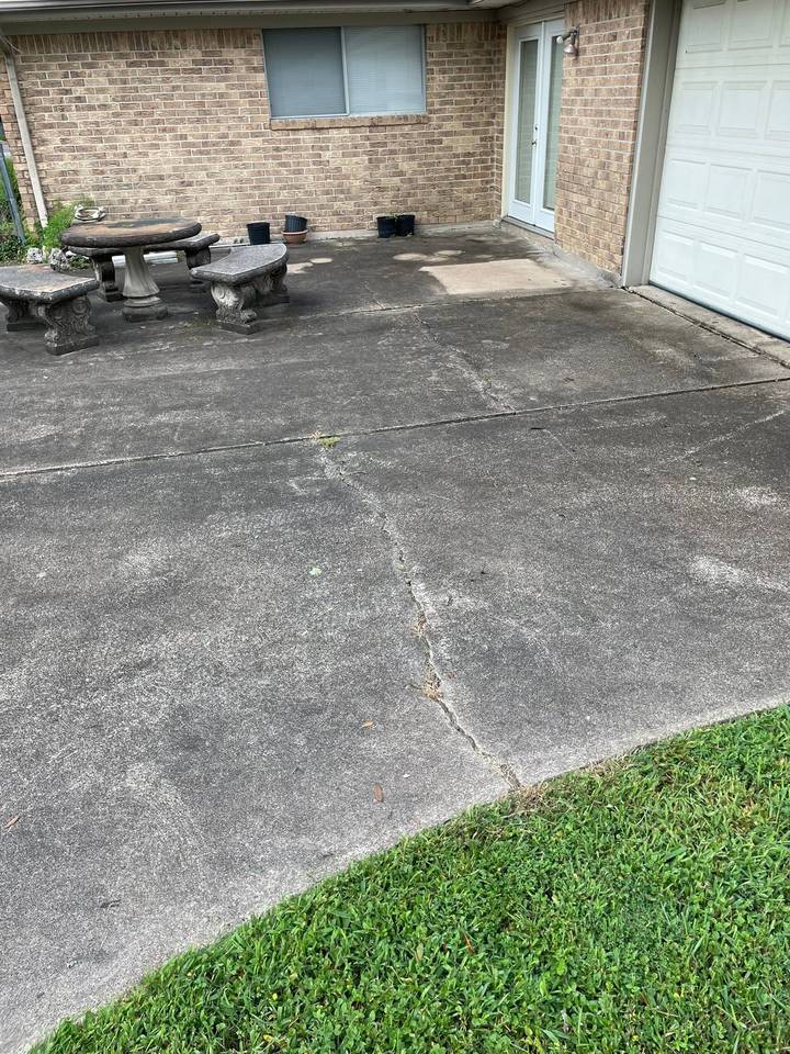 Before pressure washing: back patio