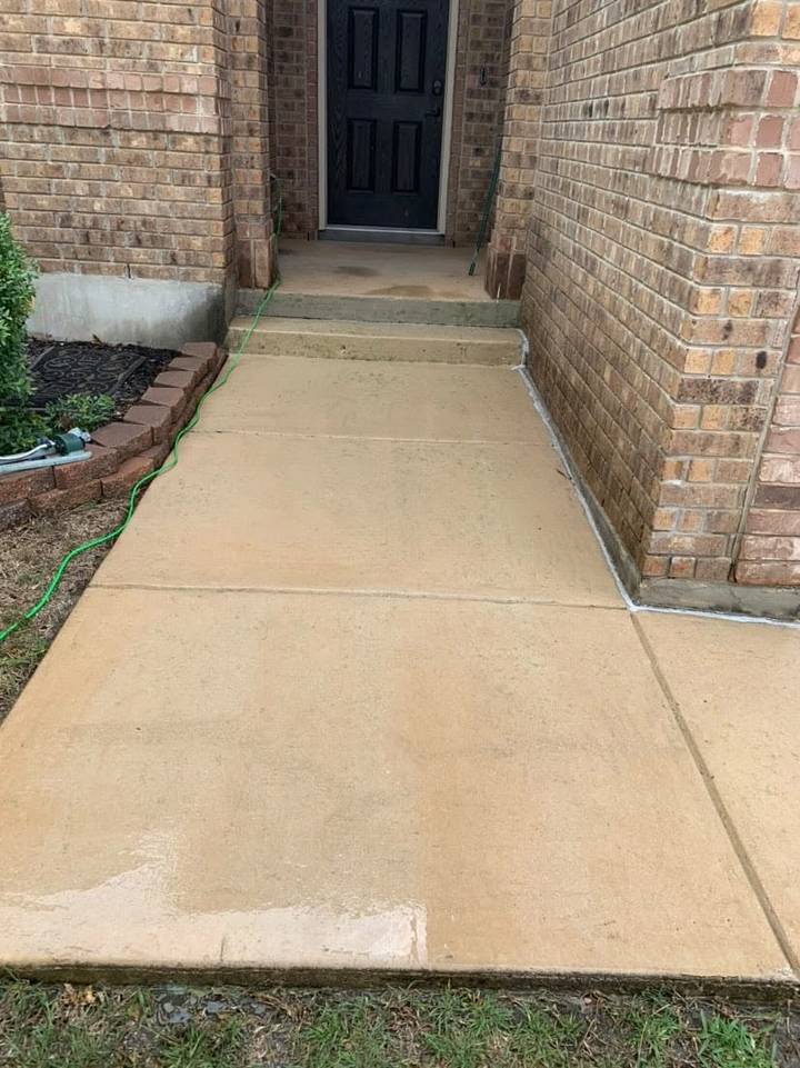 After pressure washing: front entry walk