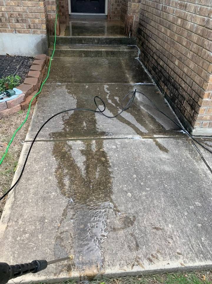 Before pressure washing: front entry walk